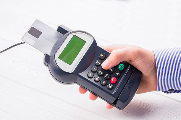 istock Man entering his pin on terminal 479567728