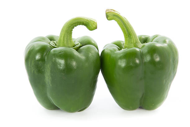 istock Green capsicum or sweet pepper isolated on white background 479568752