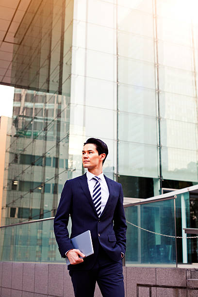 istock Japanese businessman with digital tablet, Tokyo. 479572208