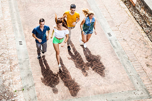 istock Friends running outdoors completely freedom 479572600
