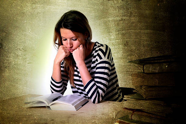 istock young stressed student girl studying and preparing MBA test exam 479572964