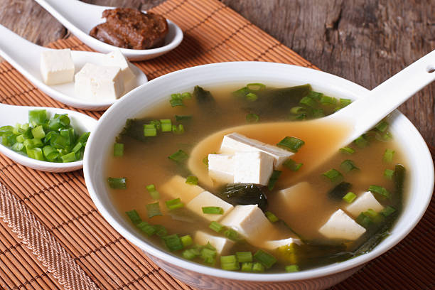 istock Japanese miso soup in bowl with a spoon vertical 479574280