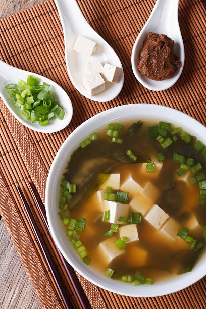 istock miso soup in white bowl and ingredients vertical top view 479574286