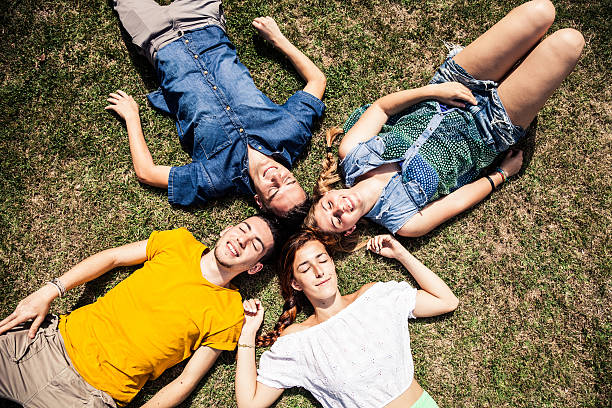 istock Relaxing laying on the grass at the park 479578948