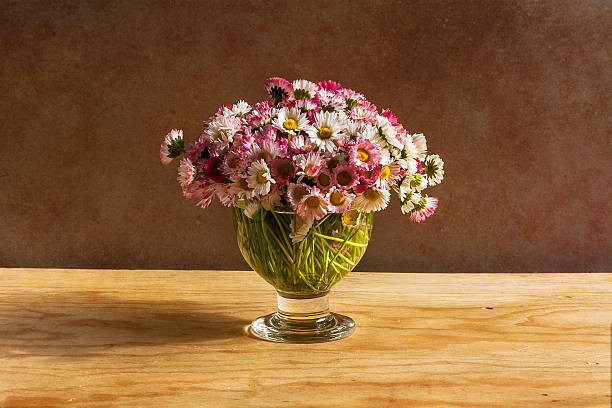 istock Still life bouquet daisies wooden table 479580061