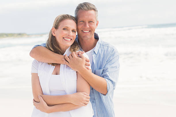 istock Happy couple smiling at camera 479581014