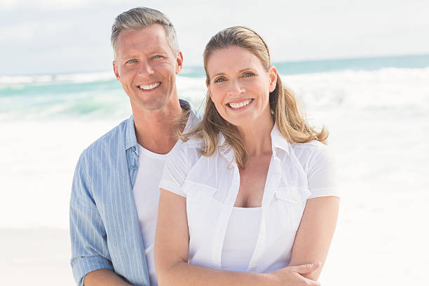 istock Happy couple smiling at camera 479581030