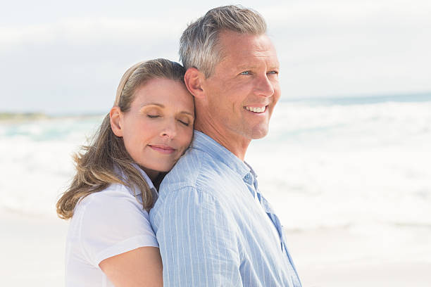 istock Happy couple standing and hugging 479581040