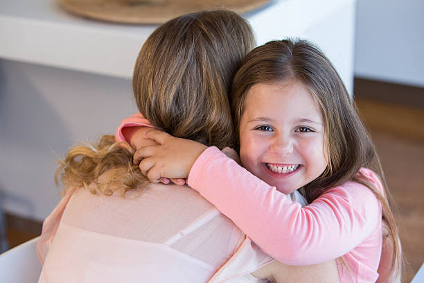 istock Father and daughter hugging 479581806