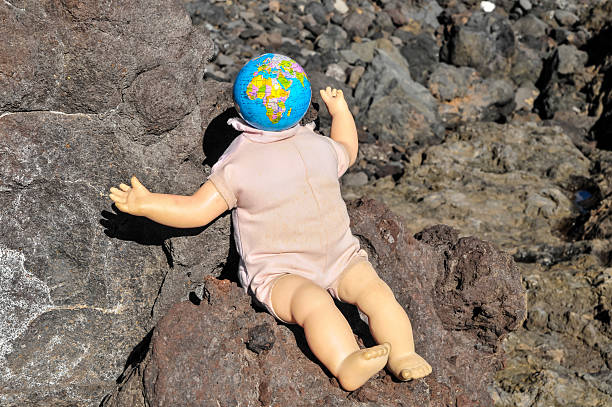 istock Vintage Old Doll with a Globe 479581873