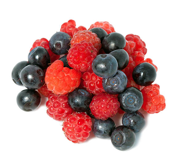 istock berries of raspberry and bilberry on white background 479582502