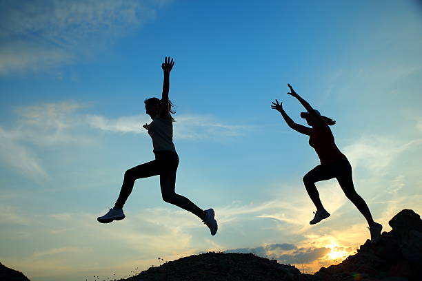 istock Two young women running 479590274