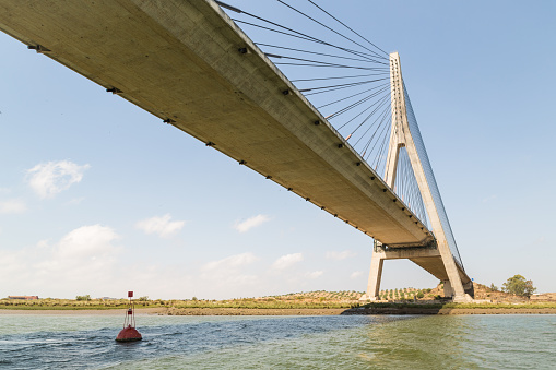 International Bridge, linking Portugal and Spain over the Guadiana river, as seen from the river.