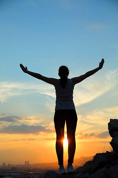 istock Woman Silhouette at sunset 479591048