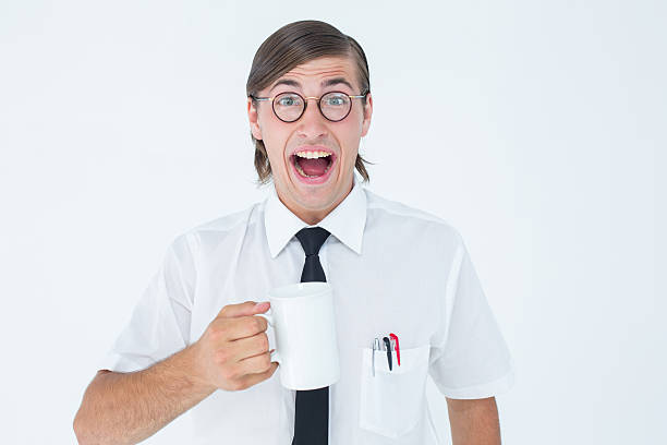istock Geeky businessman holding a mug 479591246