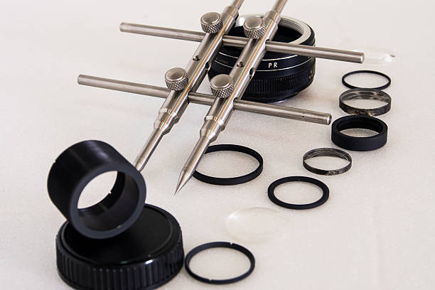 istock Lens repair with spanner tool on isolated 479594892