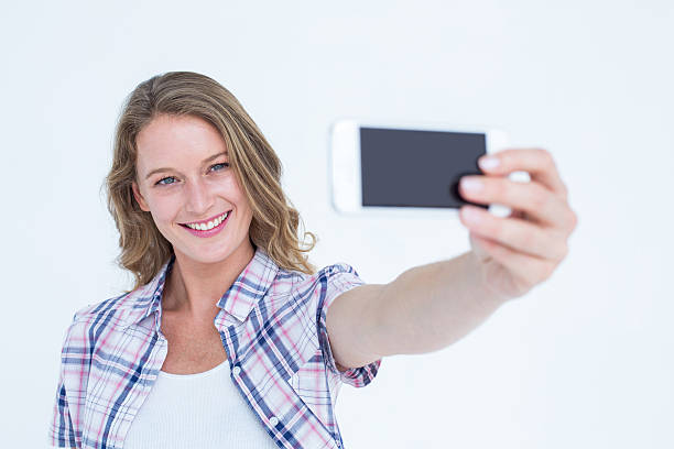 istock Pretty hipster taking selfie with smartphone 479597890
