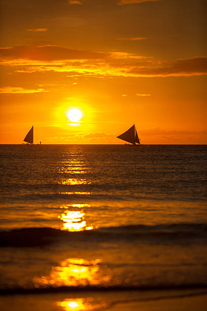 istock sailing boats on sunset 479598958