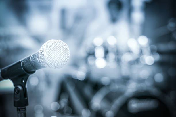 istock Close up of microphone on musician blurred background 479599214