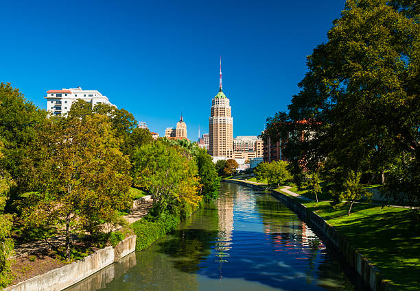 istock San Antonio skyline with riverwalk and lush trees 479599270