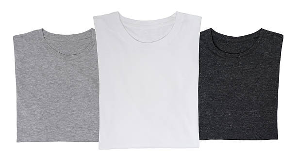 istock Close-up of the three t-shirts (black, white and grey). Isolated. 479603452