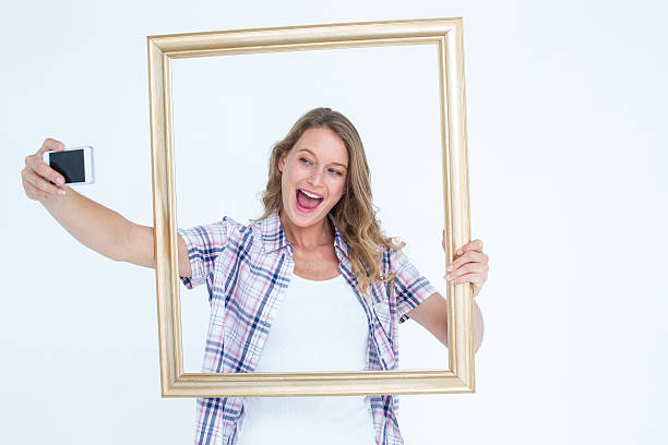 istock Pretty hipster taking selfie with smartphone 479603756