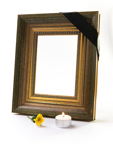istock golden mourning frame with yellow flower 479606129