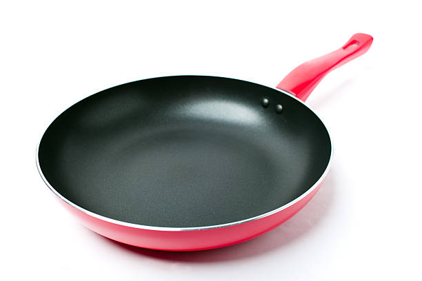 rosso padella antiaderente con copertura e teflon - pan frying pan fried saucepan foto e immagini stock