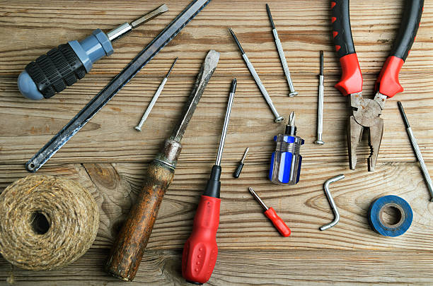istock set of work tools on a wooden table horizontal 479607586