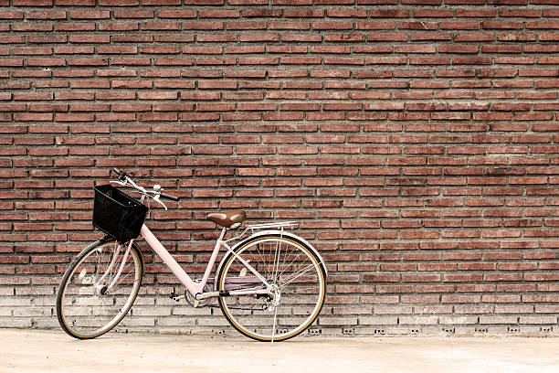 istock Vintage bicycle with old brick wall 479608240