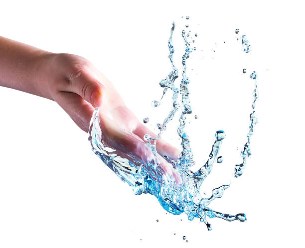 istock hand with water splash isolated on the white background 479609040