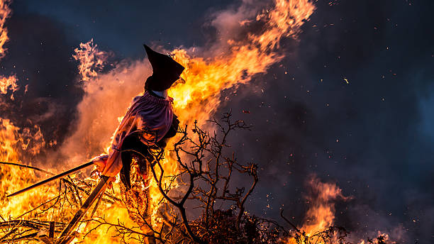 Witch Burning. Witch Burning.  Burning a witch effigy is a Danish midsummer tradition danish culture photos stock pictures, royalty-free photos & images