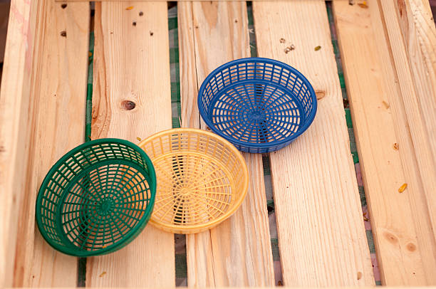 istock Three plastic basket on the wooden 479611844
