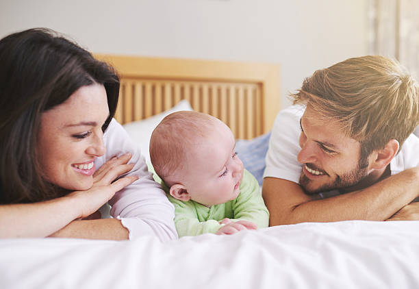 istock Sandwiched in between her loving parents 479613030