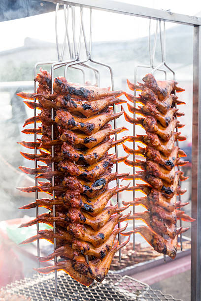 istock BBQ chicken wings at a street bazaar in Malaysia 479616320