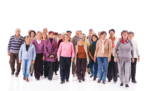 istock Crowd of old people walking towards the camera. 479618126