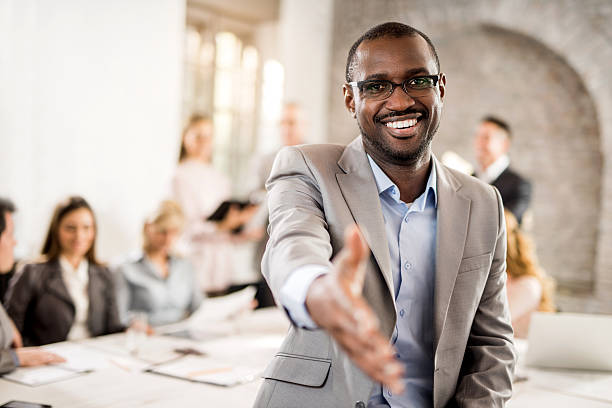 istock Happy African American businessman offering a handshake. 479618316