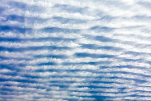 Rippled Cloud Patterns in Blue Sky