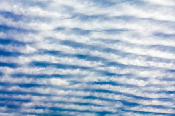 Rippled Cloud Patterns in Blue Sky