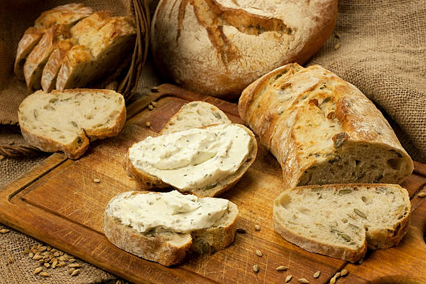 istock Tasty baguette on a wooden board 479620565