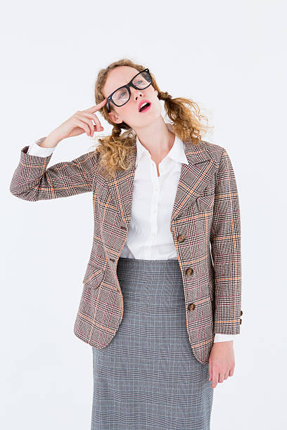 istock Geeky hipster thinking with finger on temple 479621244