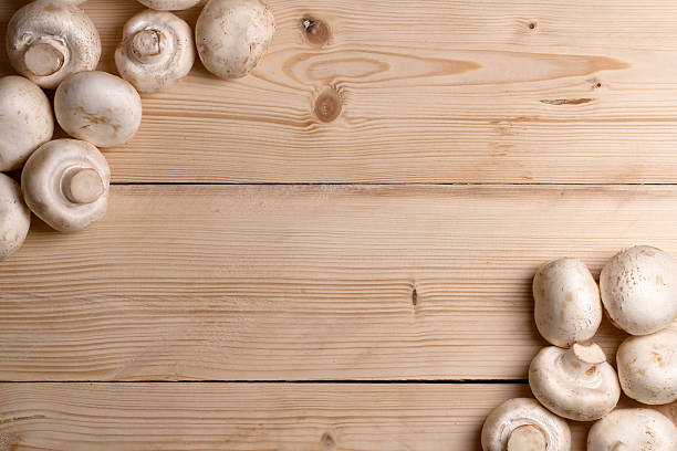 istock Mushrooms on a wooden background 479621423