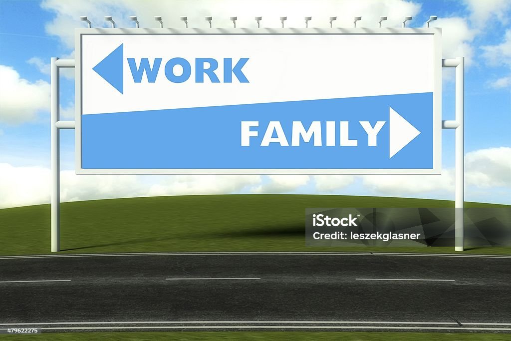 Conceptual direction signs lead to work and family Conceptual direction signs lead to work and family, concept Aspirations Stock Photo