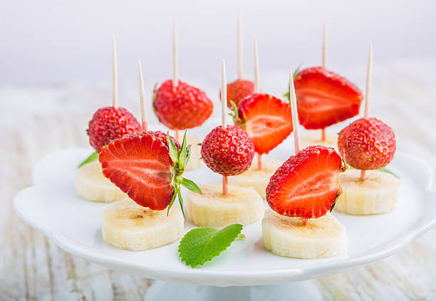 istock Strawberry and banana on a stick 479625904