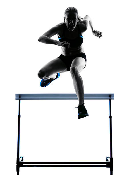 istock woman hurdlers  hurdling  silhouette 479626044