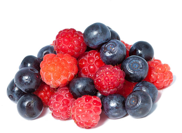 istock berries of raspberry and bilberry on white background 479626140