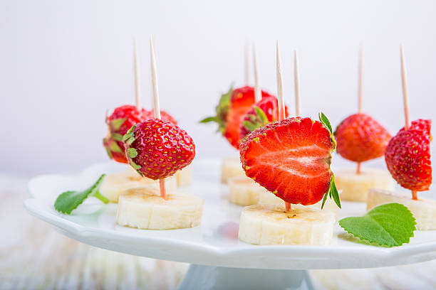 istock Strawberry and banana on a stick 479626710