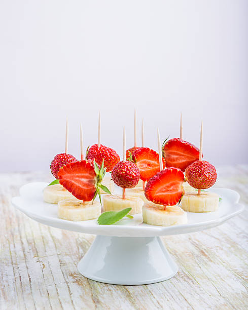 istock Strawberry and banana on a stick 479626712