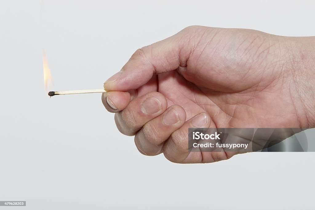 Burning Match Man hand held a burning match Matchstick Stock Photo