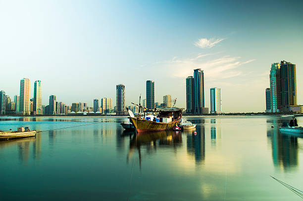 In the midddle a boat in sharjah corniche emirate of sharjah stock pictures, royalty-free photos & images